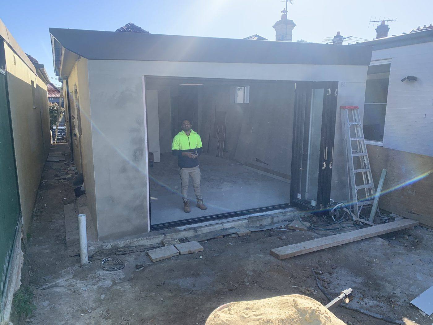 Rendered rear extension with new roofline and glazing, Dulwich Hill by Loel Homes