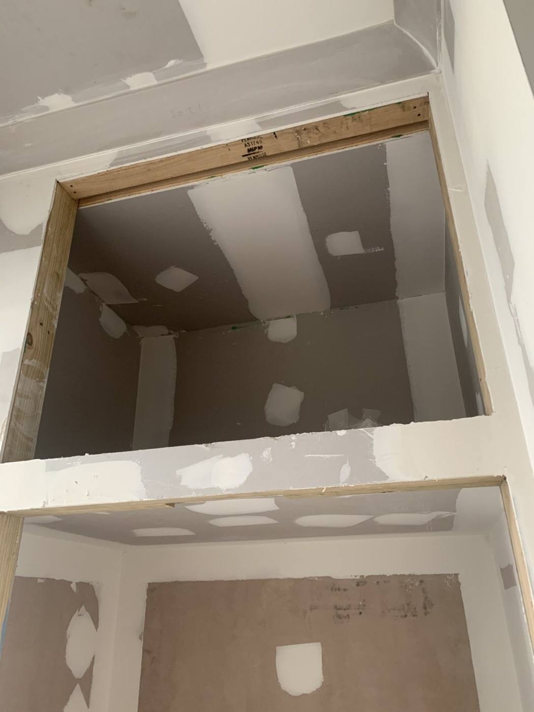 Plastered overhead storage void framed above a built-in cupboard, ready for extra storage, Dulwich Hill by Loel Homes