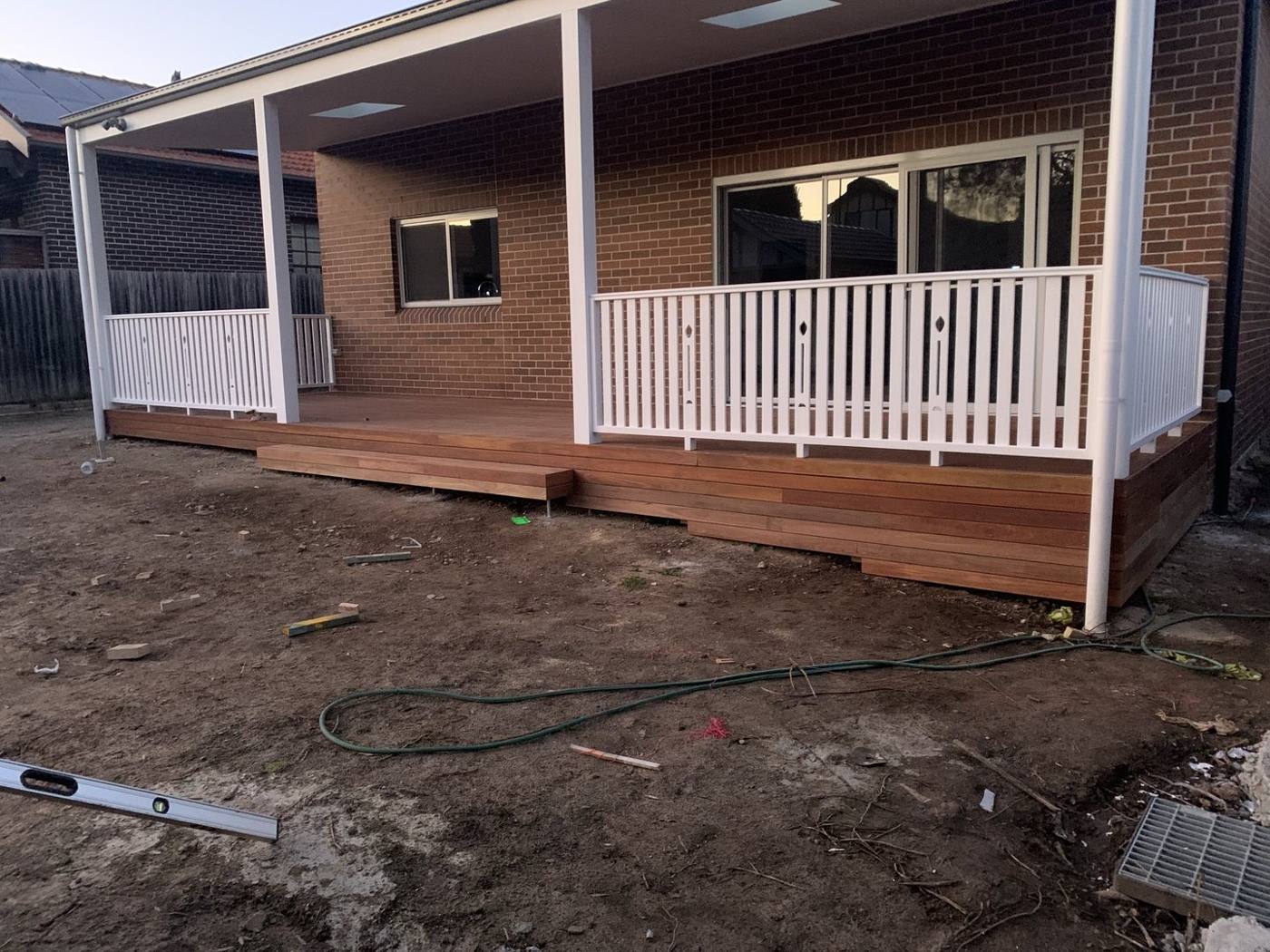 Angle view of the finished verandah deck with white timber balustrade by Loel Homes